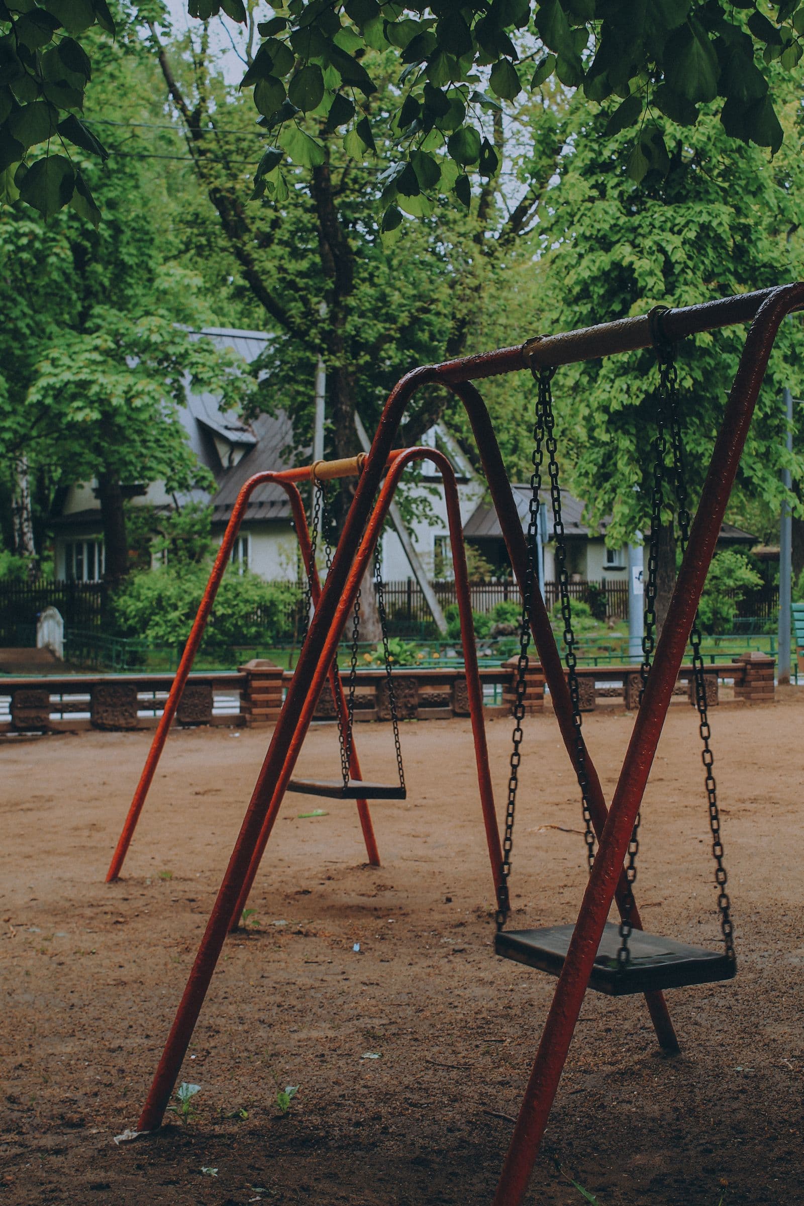 Empty swings in a quiet playground
