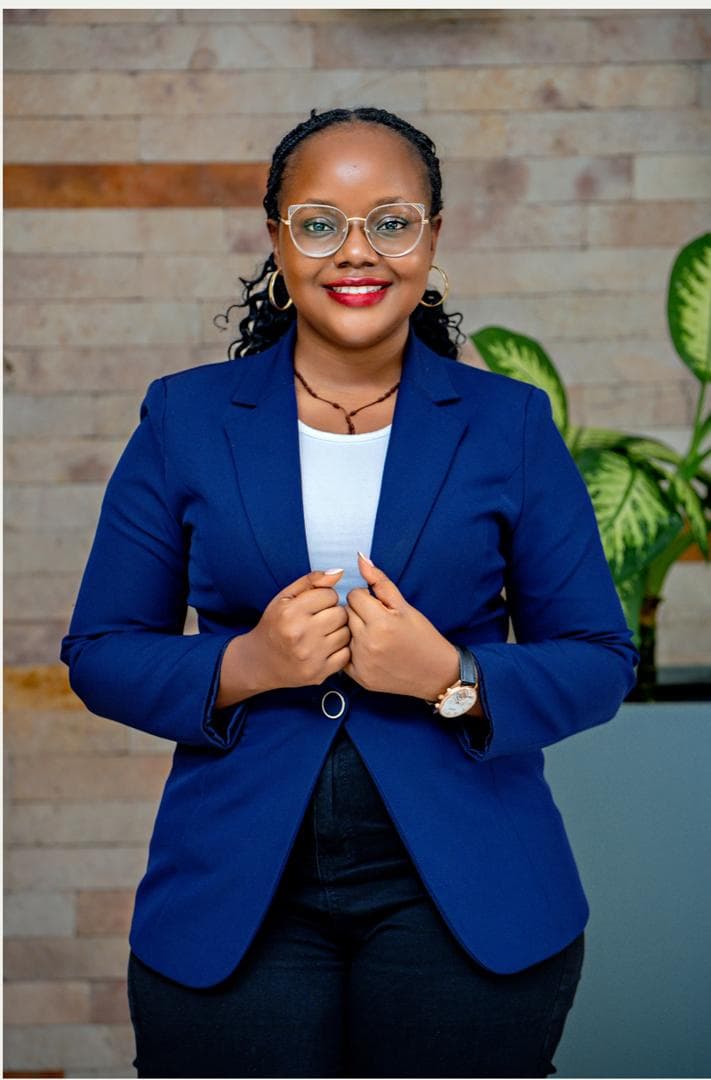 Maryheals, psychologist, standing in a professional portrait